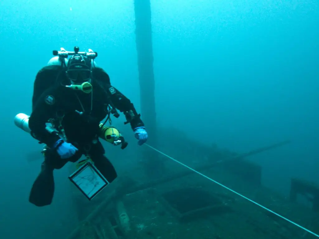 Technical Diver studing the Schooner Defiance Wreck - Photo By NOAA on Unsplash
