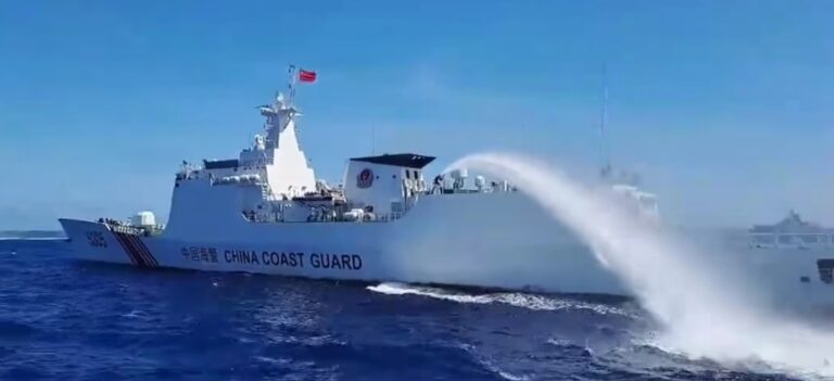 China Coast Guard boat deploys water cannon - Photo by Philippine Coast Guard at Philippine Coast Guard
